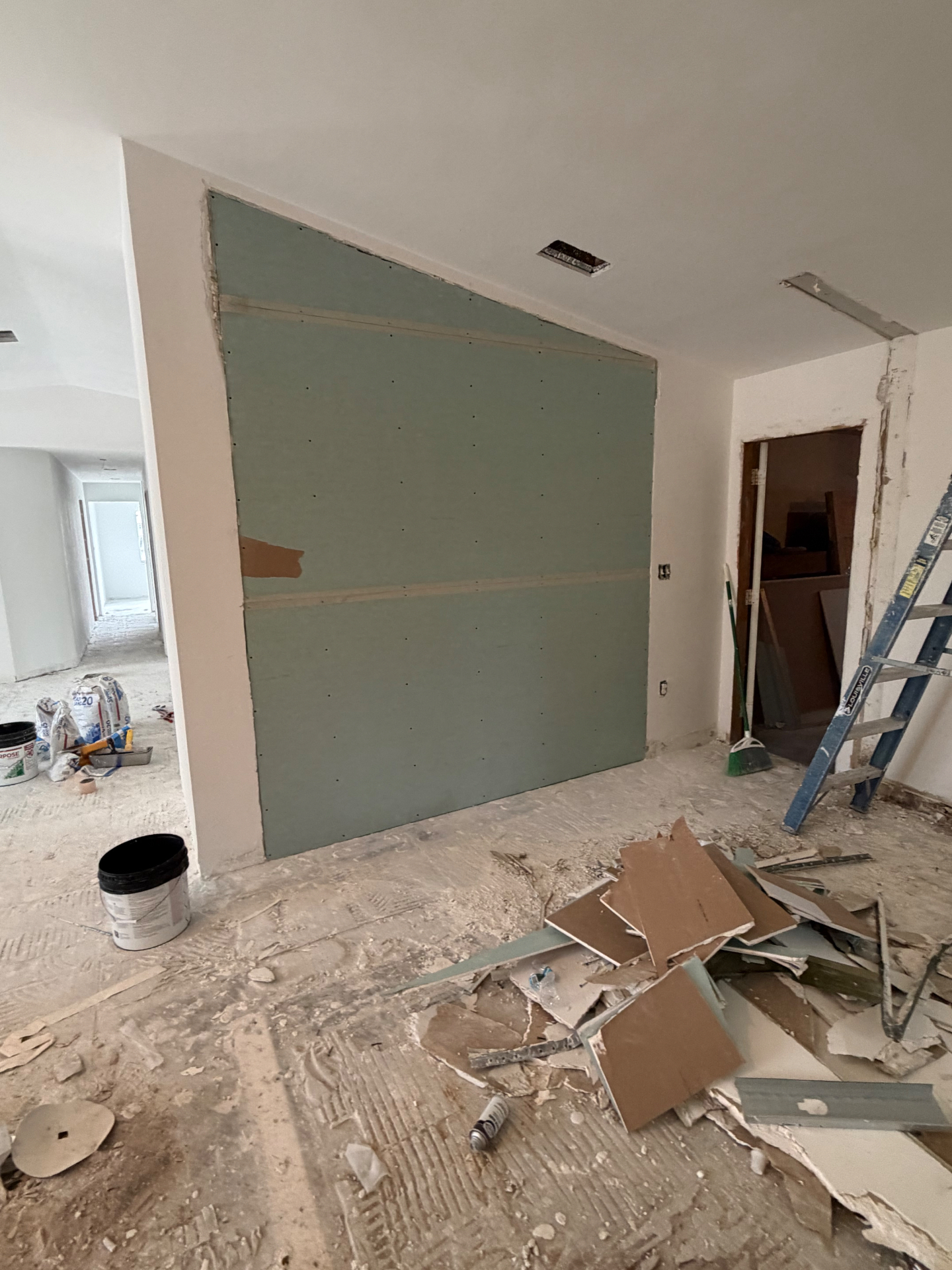 Kitchen opening framed with moisture board before skim coat